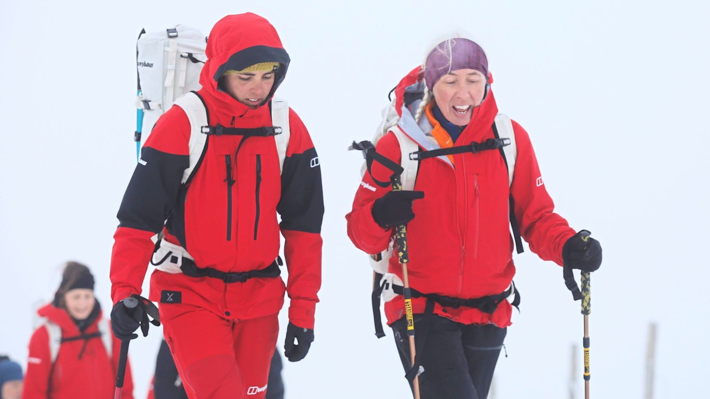 Hikers on a snowy mountains