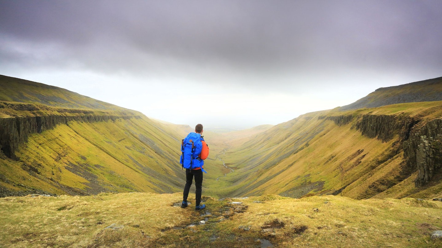 Hiker at High Cup Nick in the North Pennines