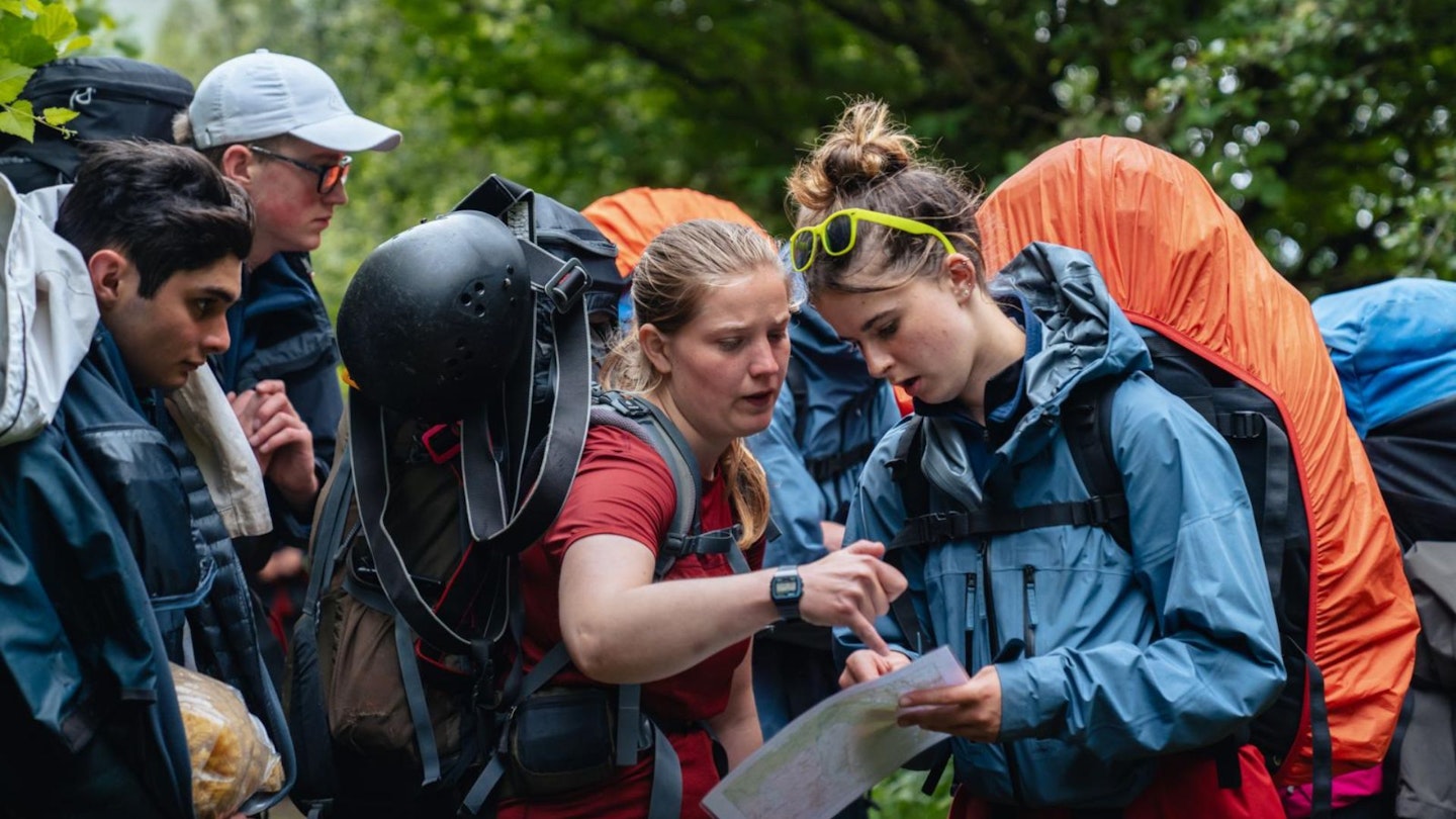 Young female hikers on a group hike