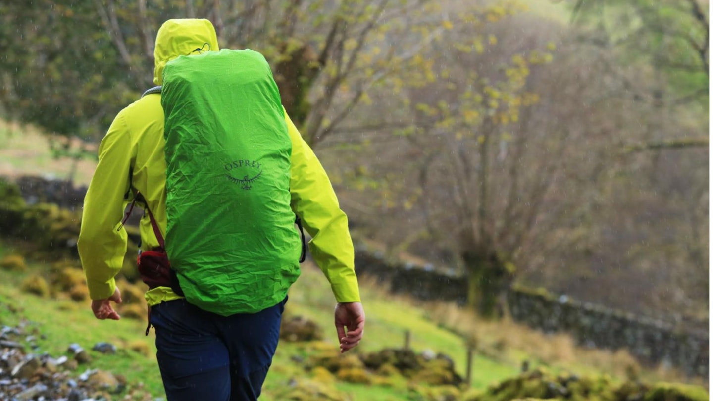 Hiker walking in the rain