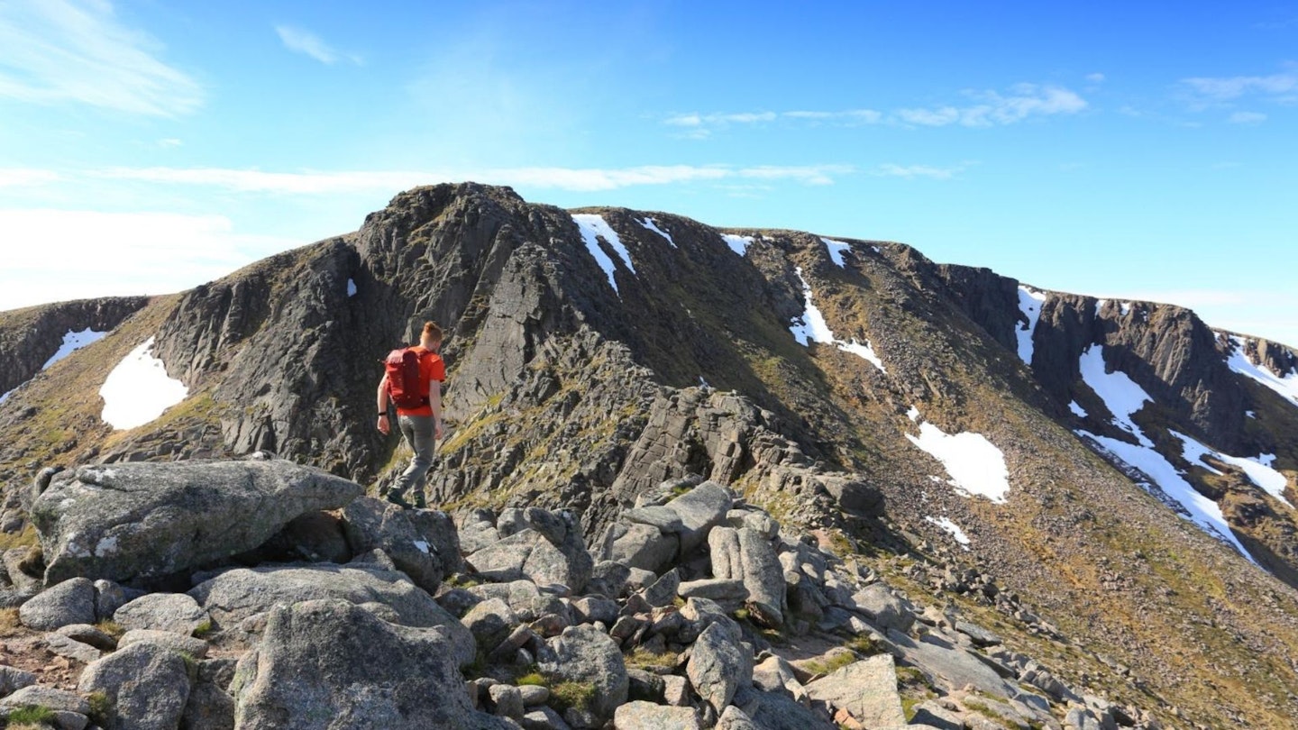 Hiker high on the Fiacaill Ridge, Cairn Gorm, Cairngorms