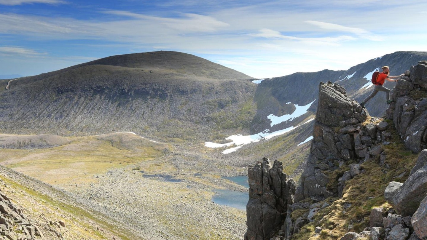 Scrambling on the Fiacaill ridge with Cairn Gorm behind, Cairngorms National Park