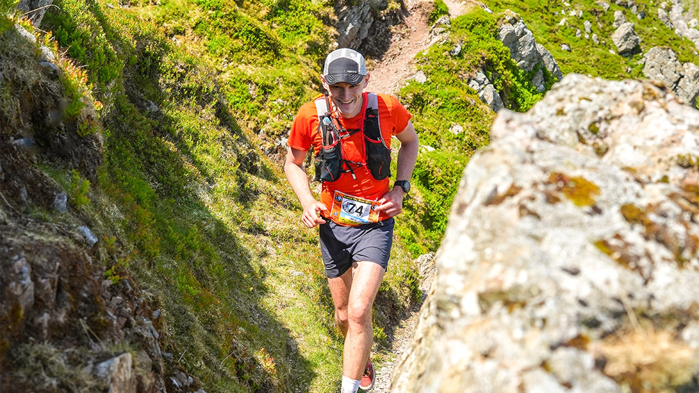 man skyrunning in technical terrain