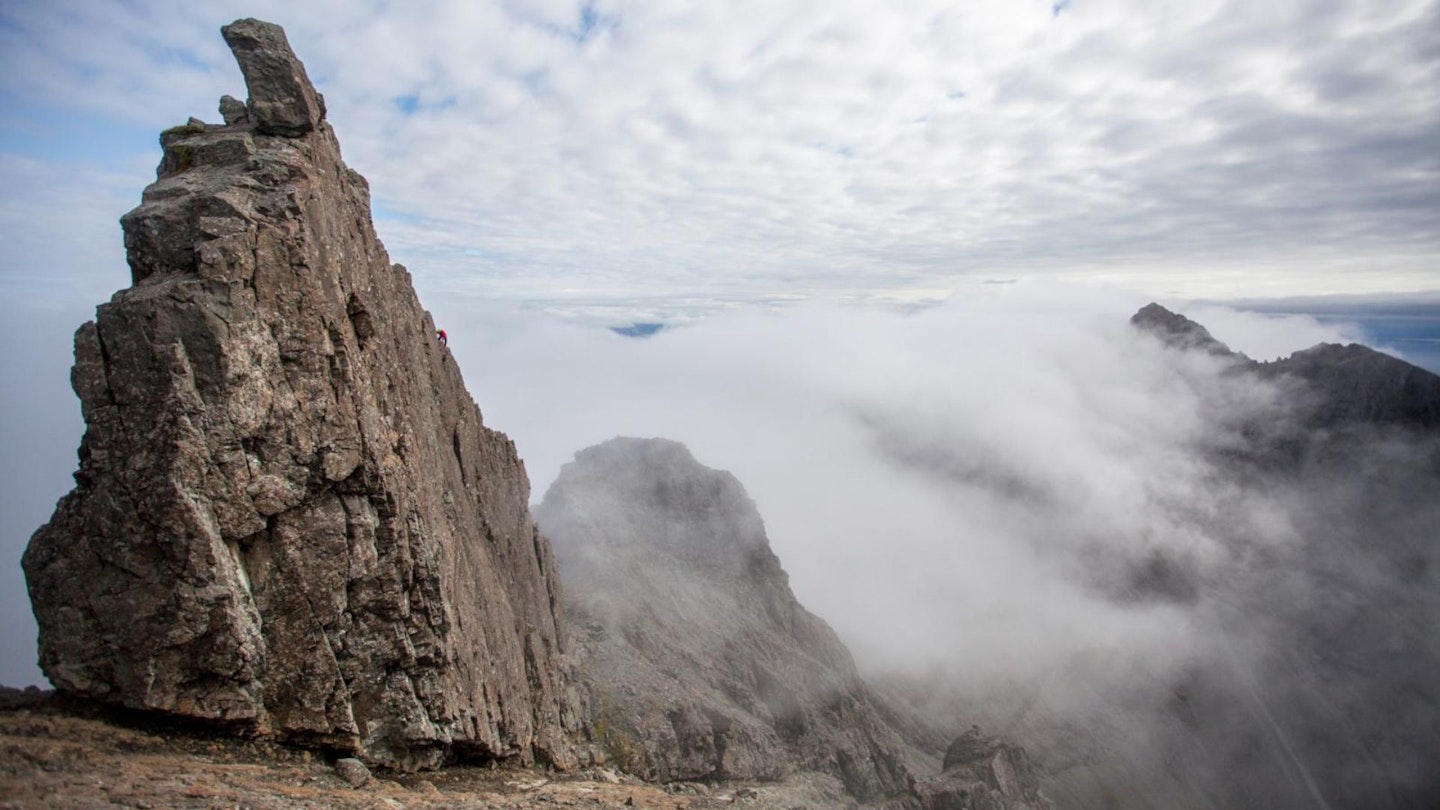 Climber on Sgurr Dearg Inaccessible Pinnacle Isle of Skye Trail 100