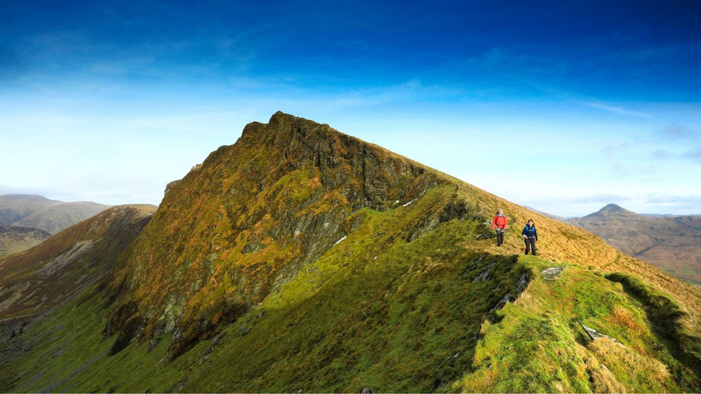 Walkers on Mynydd Drws-y-Coed Nantlle Ridge in Snowdonia, Trail 100