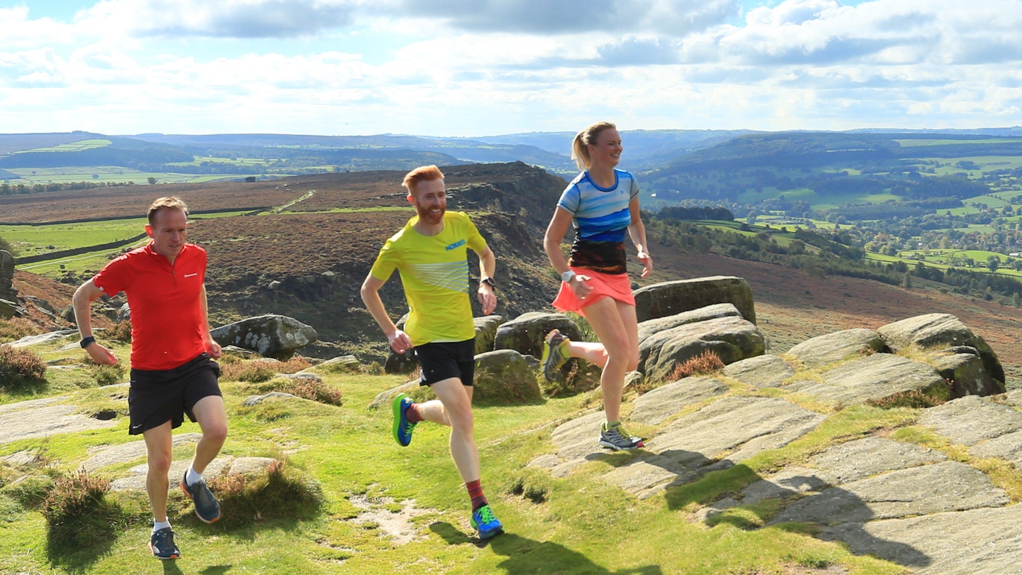 group of trail runners in the peak district
