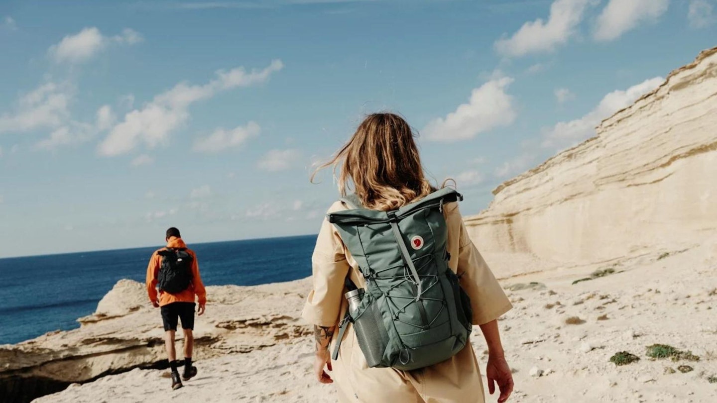 Hikers using the Fjallraven Abisko trekking pack best backpack brands