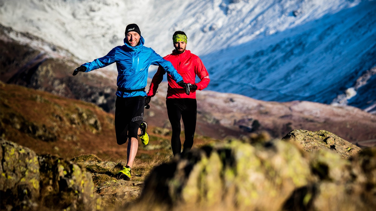 Happy runners in the alps