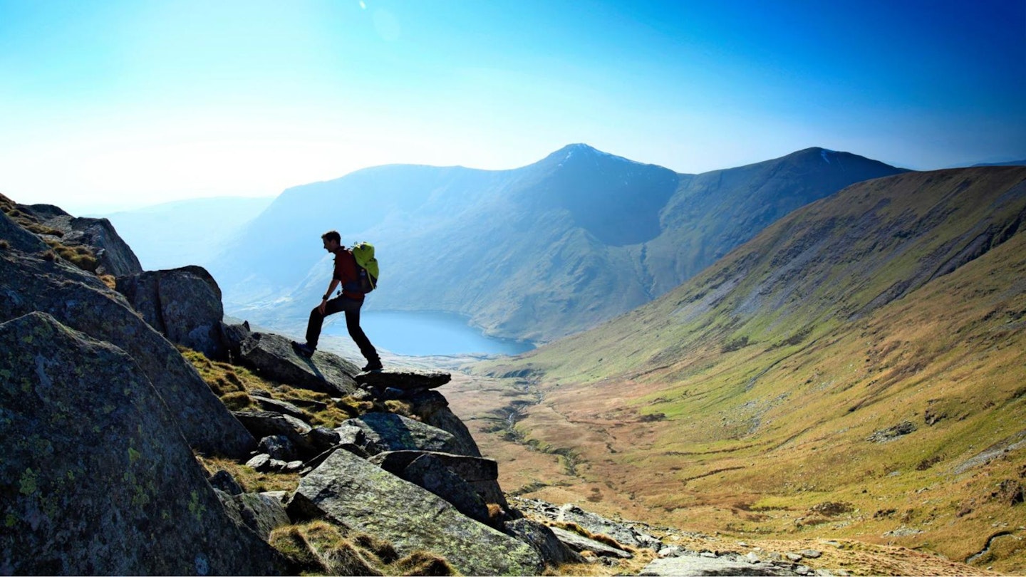Hiker on the Kentmere Horseshoe in the Lake District. One of the best hikes in the UK