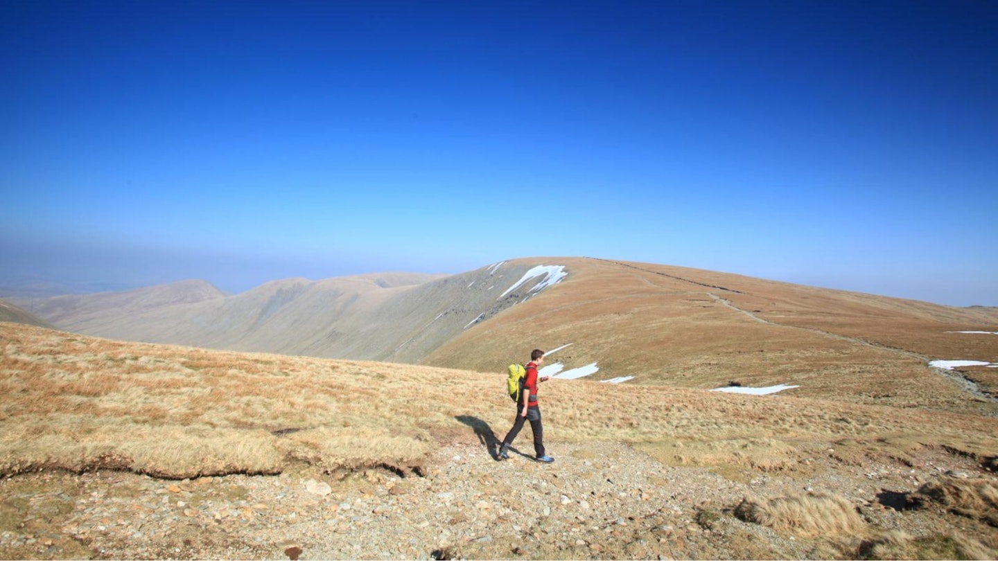 Leaving Thornthwaite Crag Beacon High Street in the distance Kentmere Horseshoe Lake District