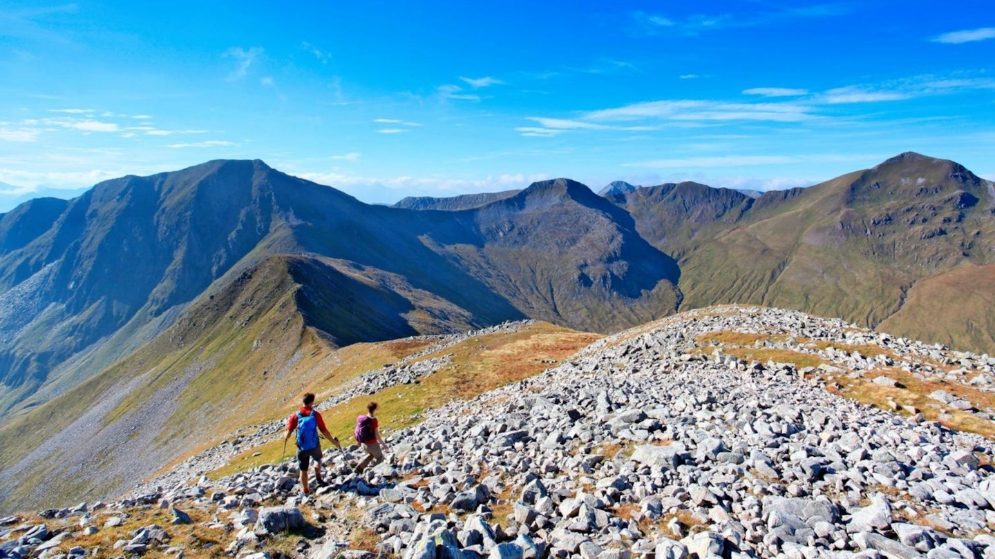Hikers on the Ring of Steall Mamores Scottish Highlands
