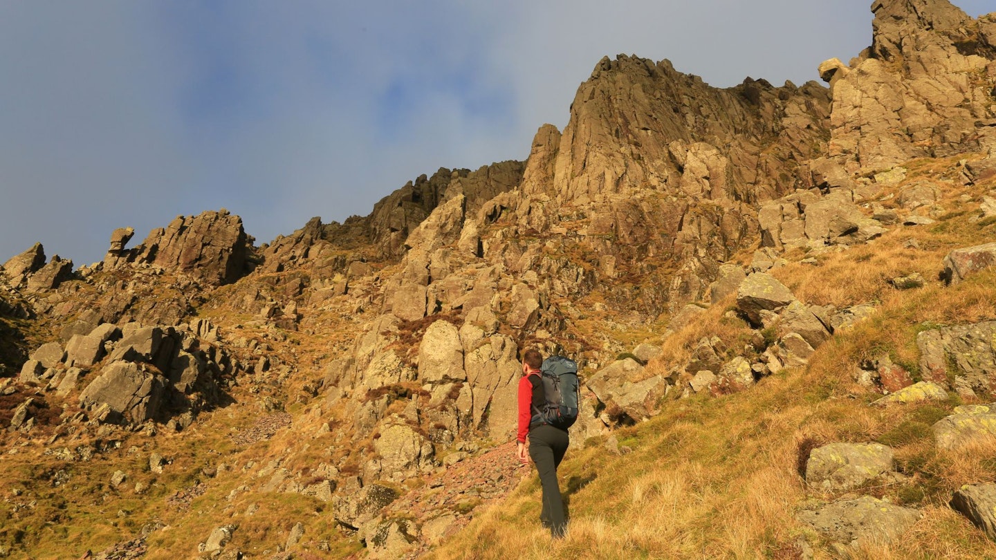 Hiker below Great Napes Great Gable Lake District