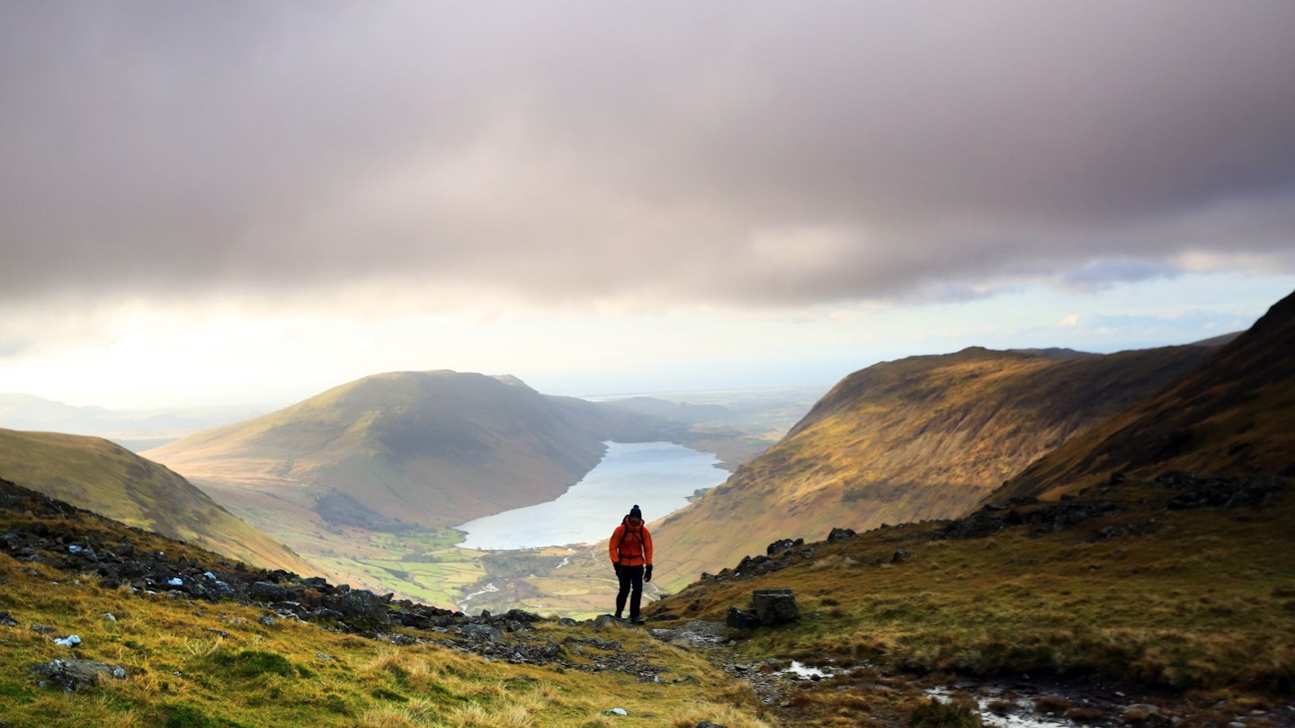 Walker at Beck Head Great Gable Lake District