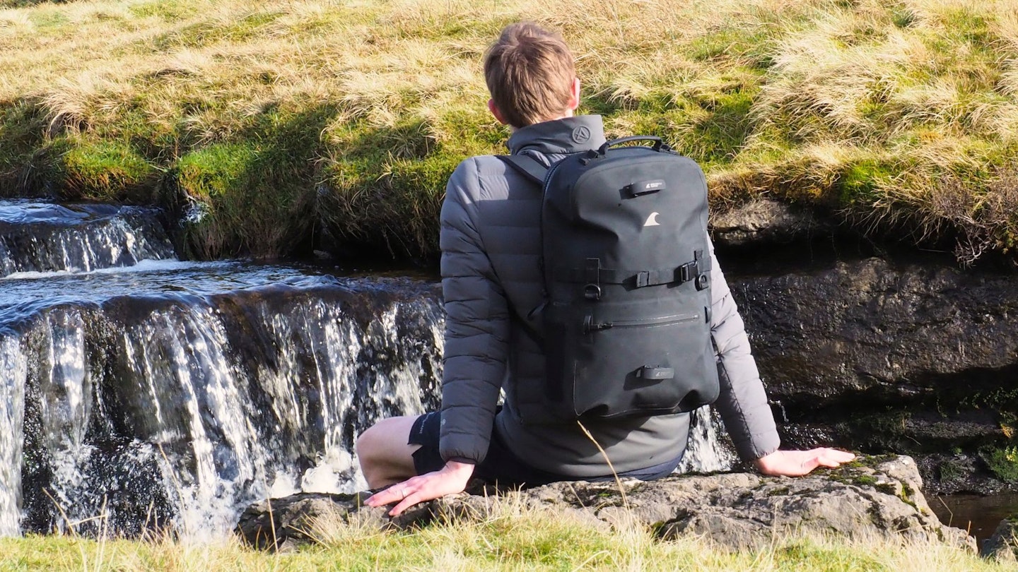 LFTO tester wearing Breakwater Supply Fogland Waterproof Backpack