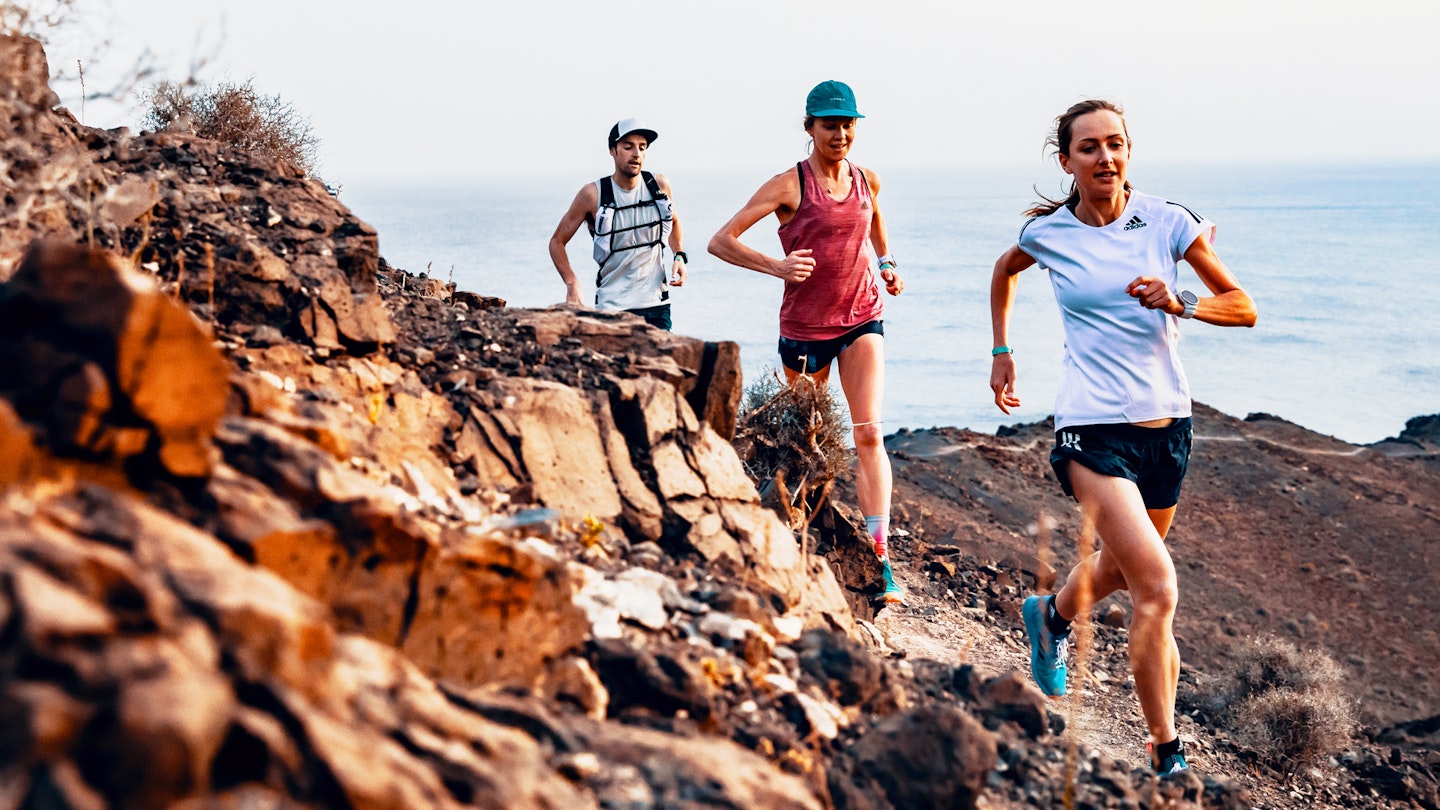 friendly runners on the mountain trails