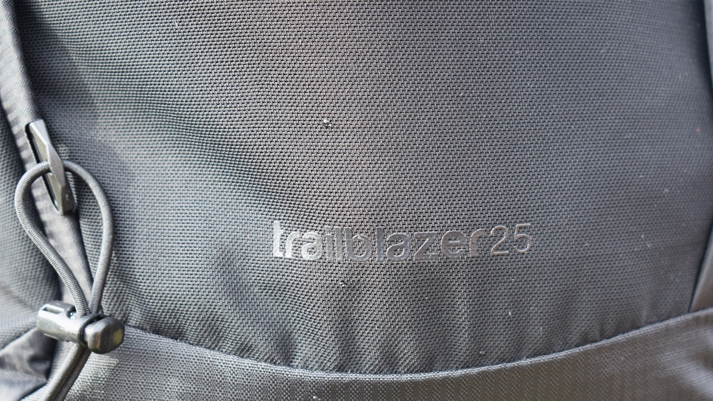 mesh exterior and logo of the montane trailblazer 25l hiking pack