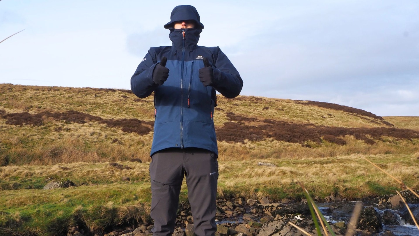 LFTO tester wearing Mountain Equipment Makalu Jacket with thumbs up