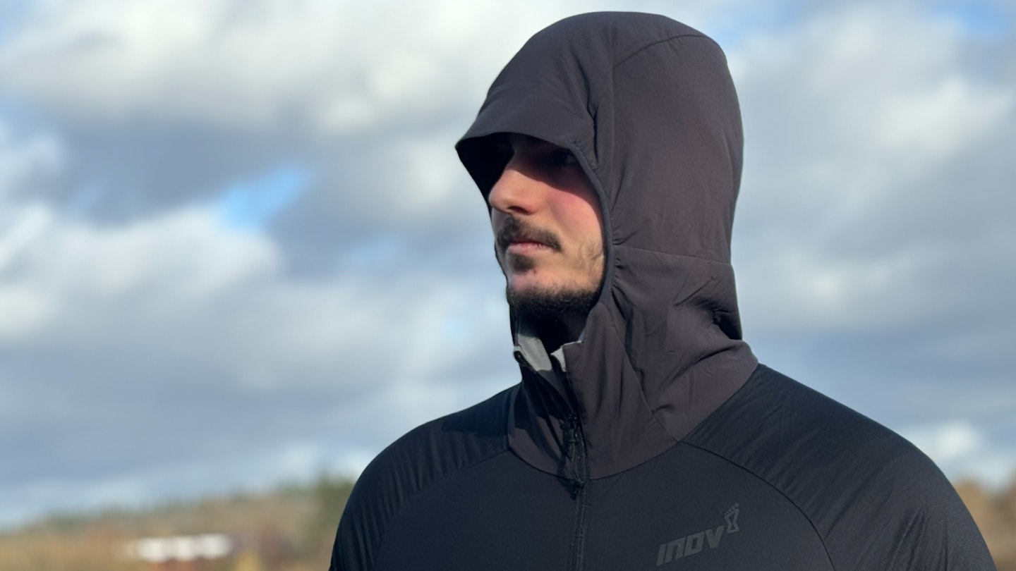 raised hood of the inov8 performance hybrid jacket