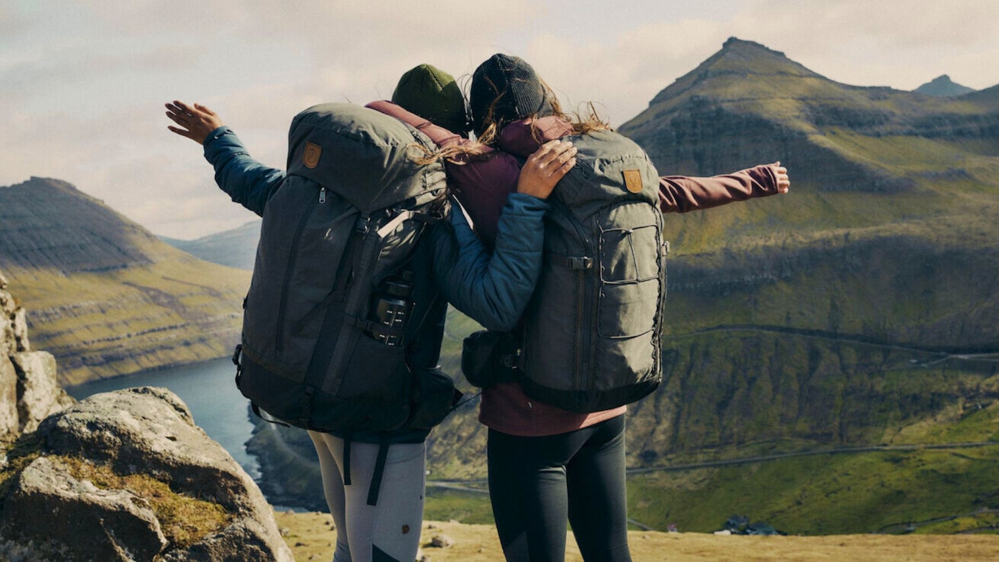 Two female hikers with Fjallraven packs