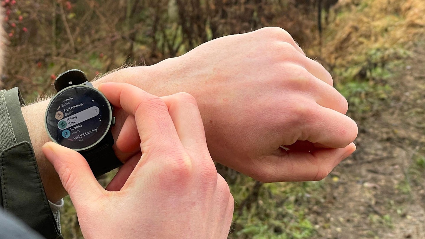 Hiker using a Suunto watch