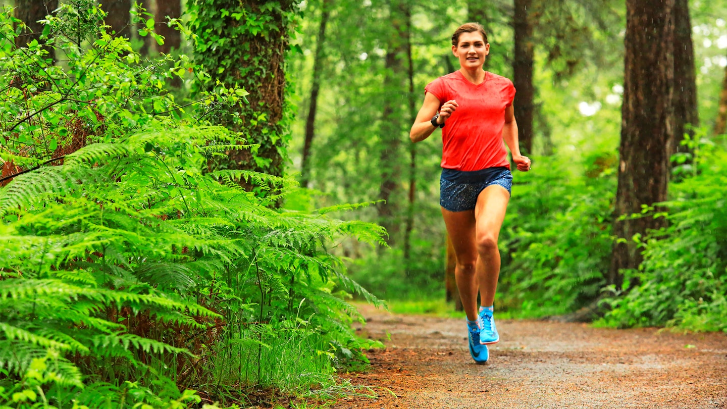 trail runner in the woodland