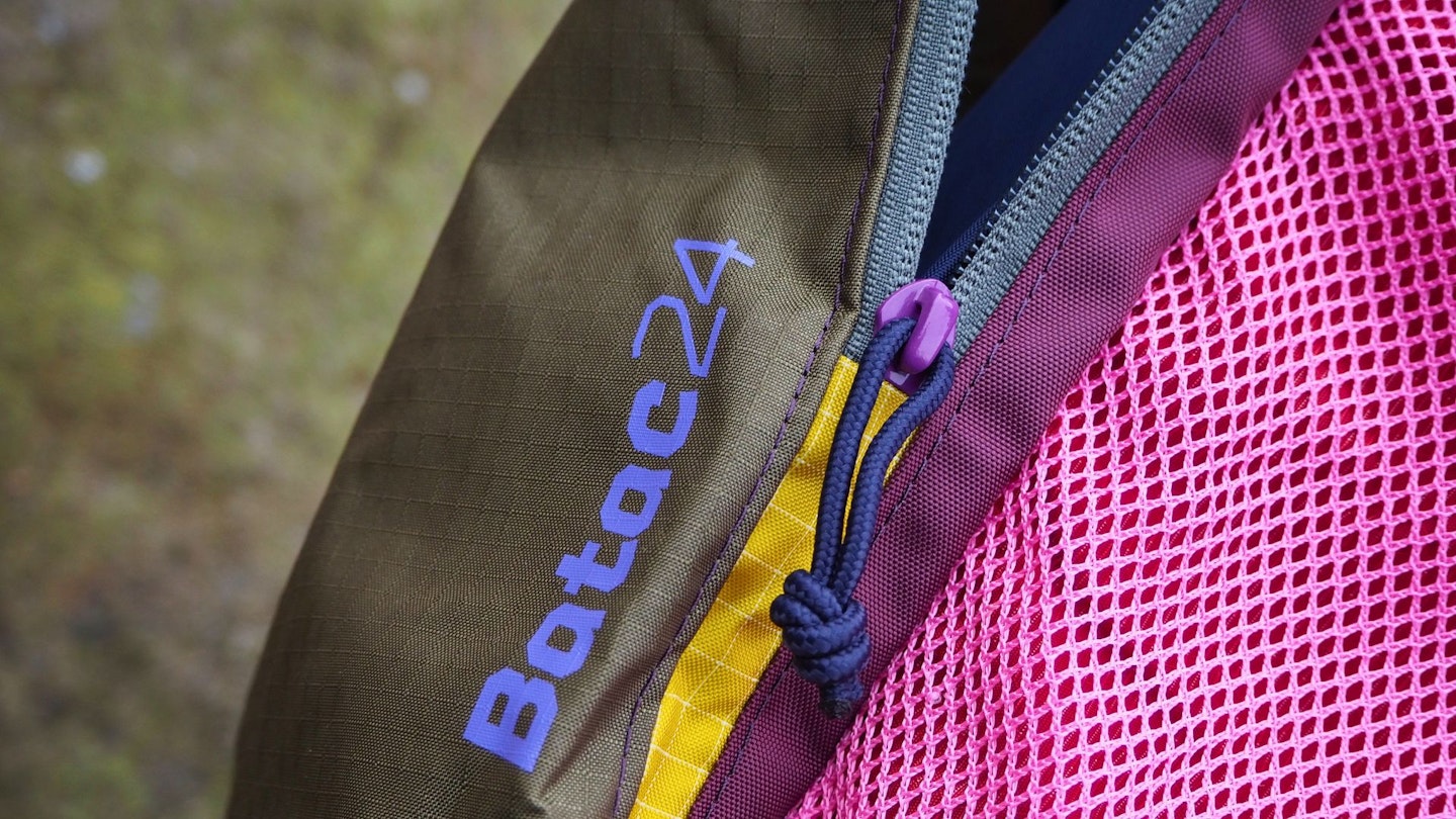 Cotopaxi Batac 24L Backpack model label and zip
