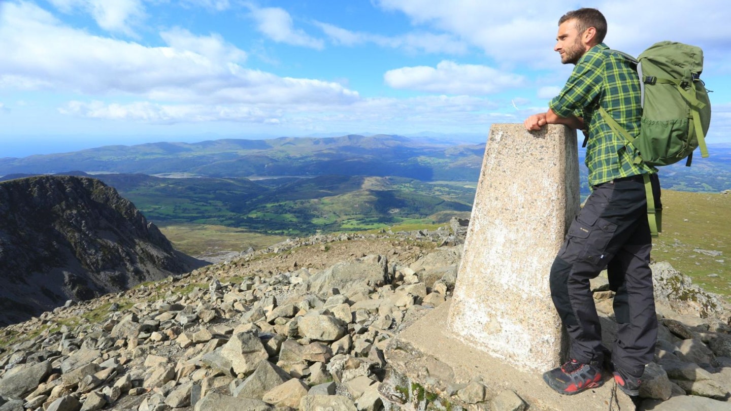 Hiker at summit area of Cadair Idris Snowdonia Cadair Idris Oli Reed