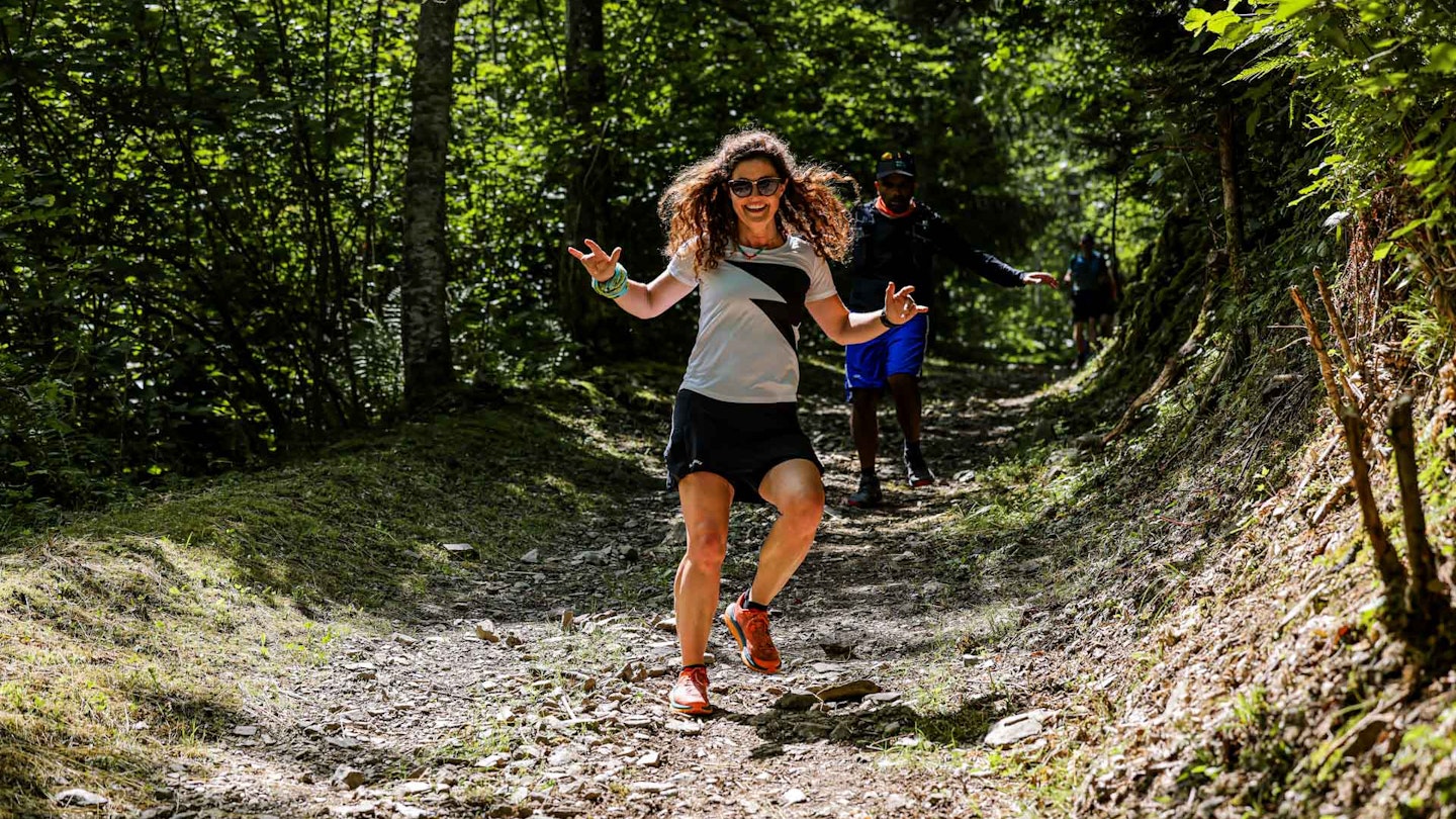 trail runner on a rocky descent