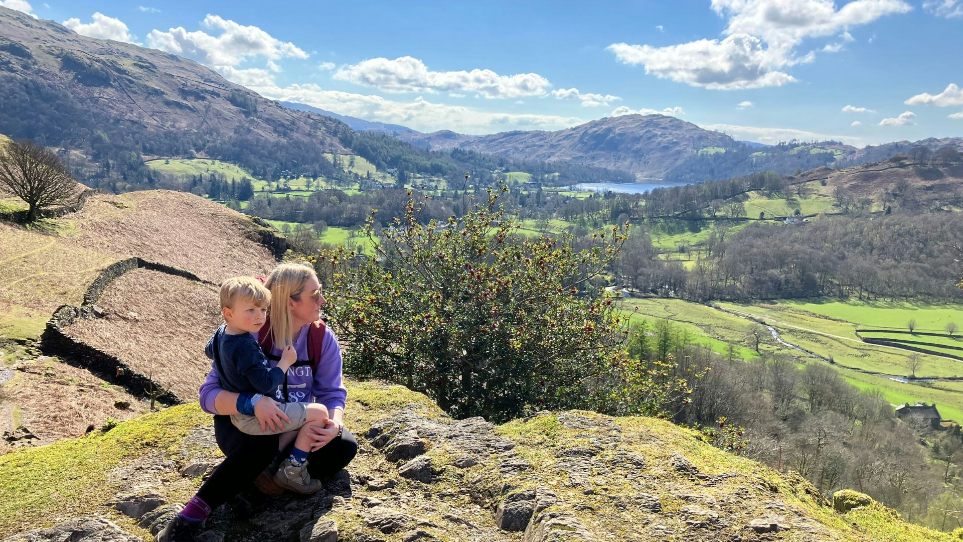 Family climbing Helm Crag Lake District