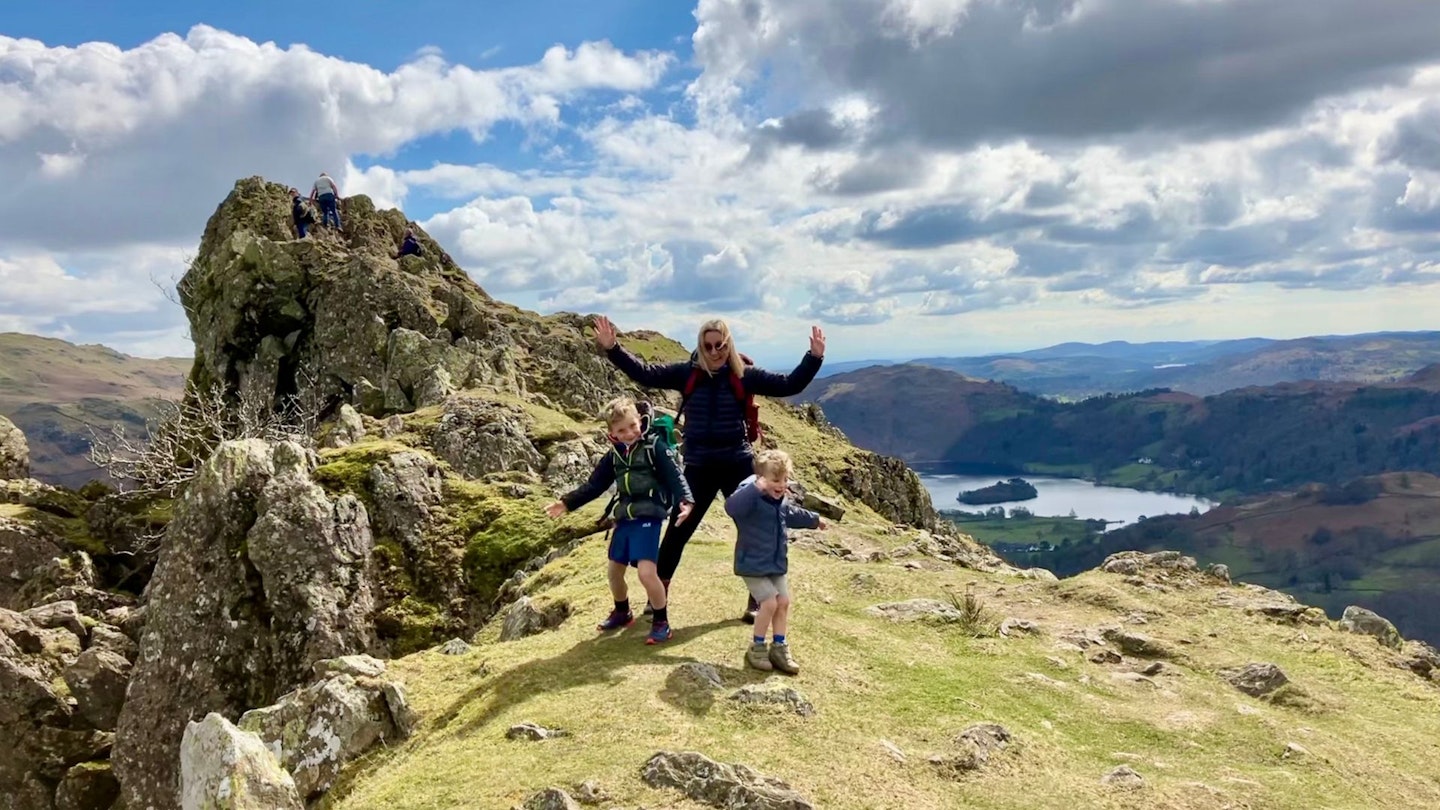 Family on summit of Helm Crag Lake District