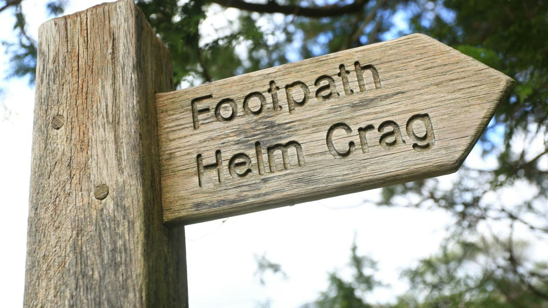 Helm Crag signpost Lake District