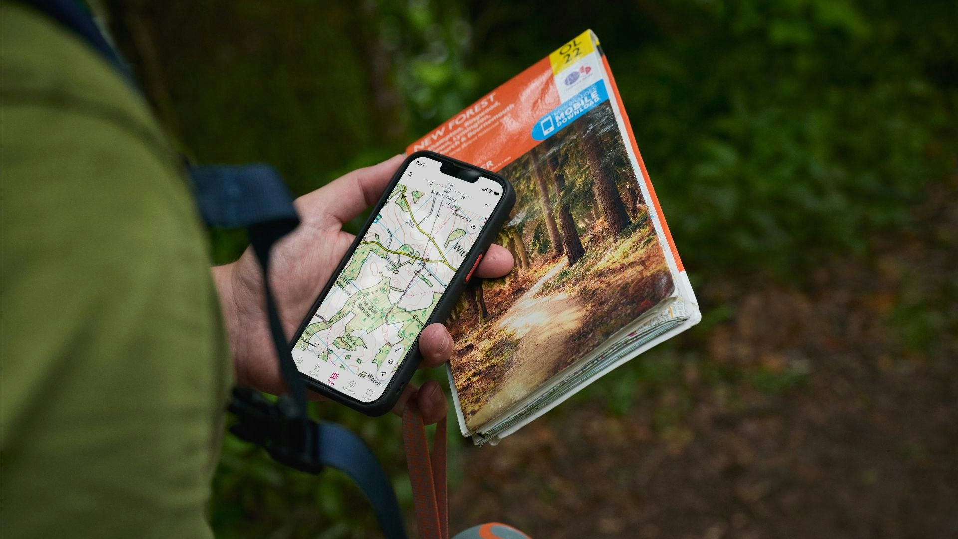 Hiker using OS Maps