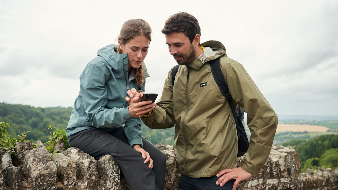 Hikers using OS Maps