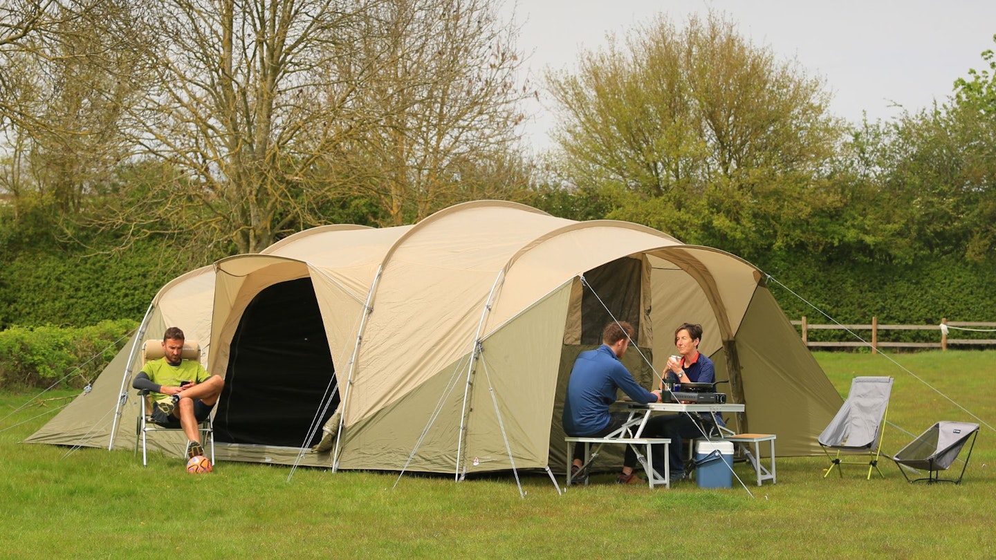 Campers sitting outside Robens Eagle Rock 6+2XP tent