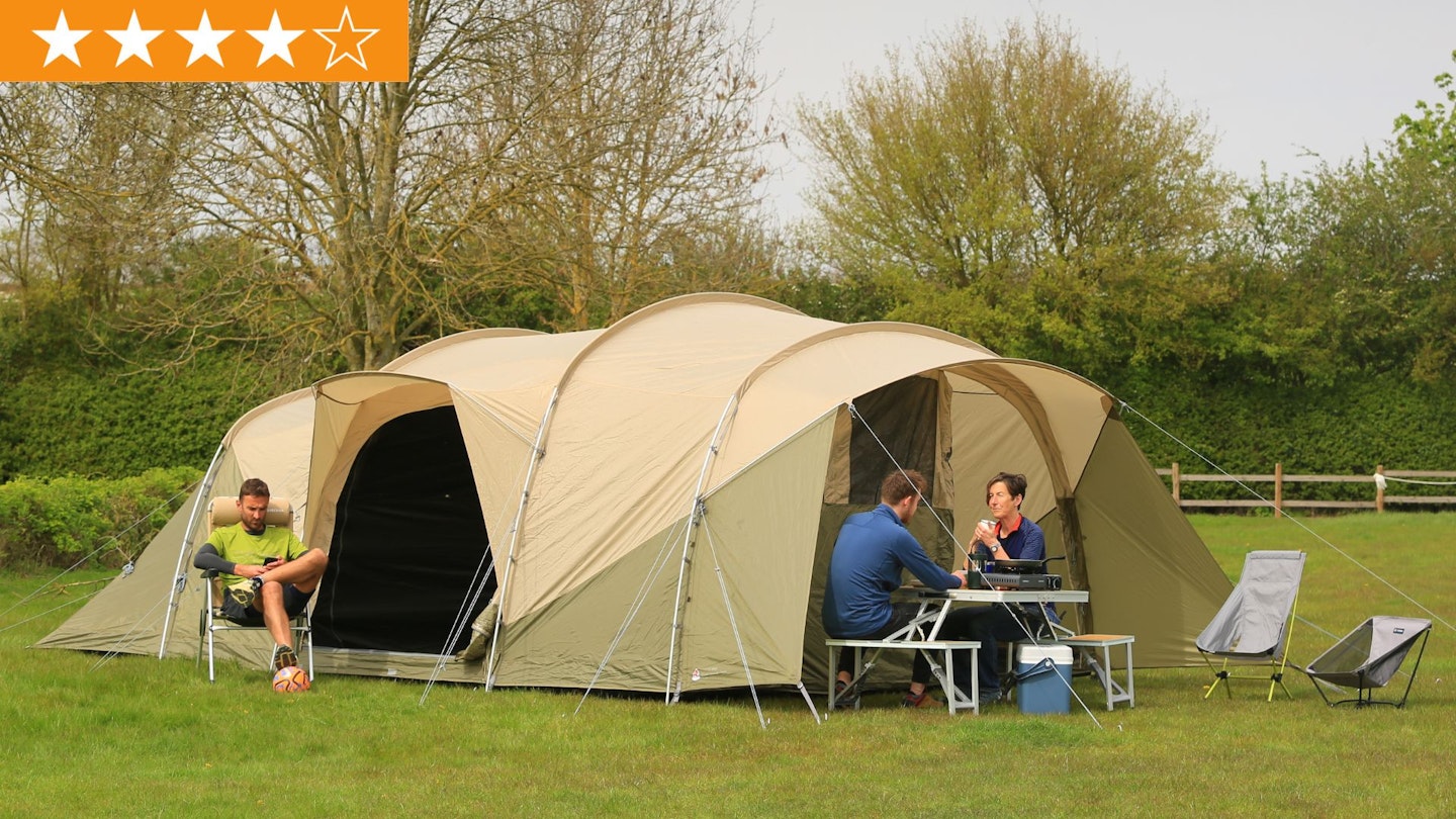 Campers sitting outside Robens Eagle Rock 6+2XP tent with LFTO star ratings in top corner