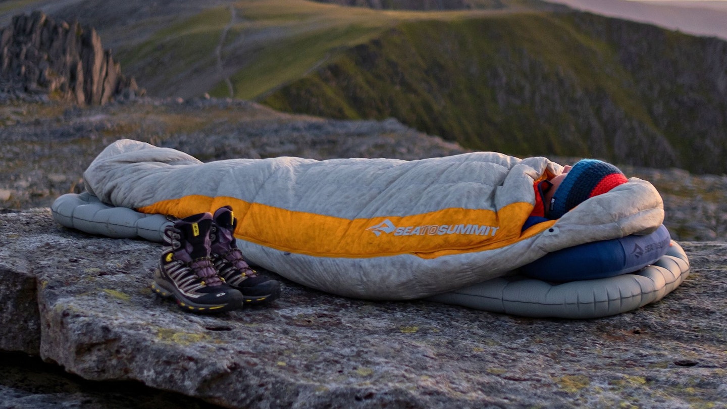 Hiker sleeping in a Sea to Summit Spark SPIII