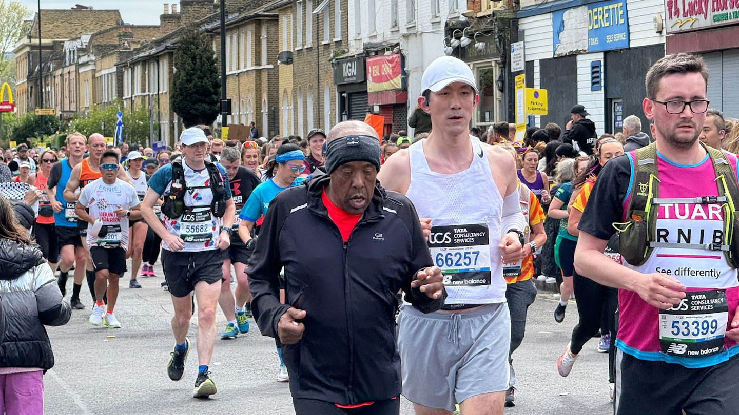 Tired runners running the London Marathon 2024