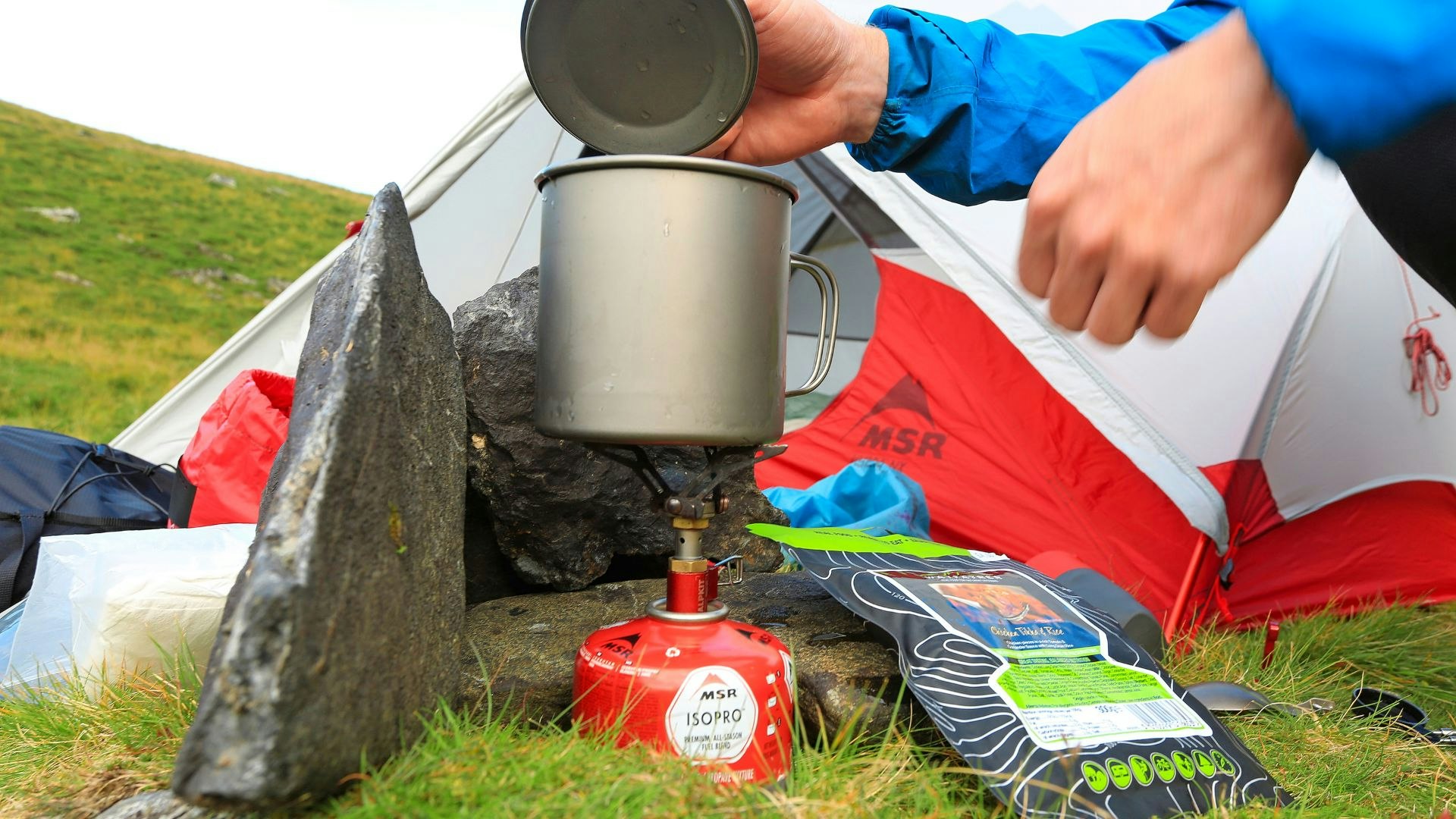Titanium mug on a camping stove as a lightweight setup