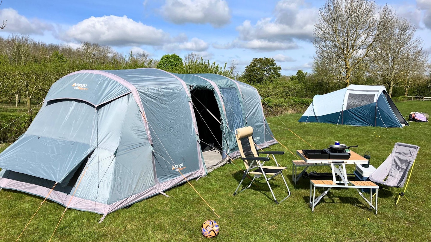 Two tents pitched at a campsite as part of LFTO's family tent group test