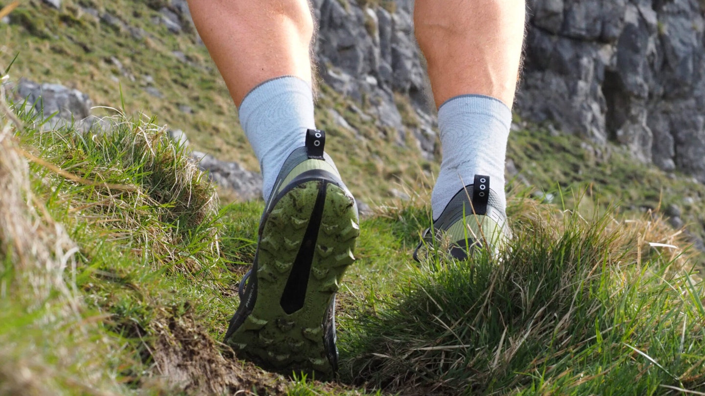 View of Saucony Peregrine 14 GTX sole as runner goes uphill