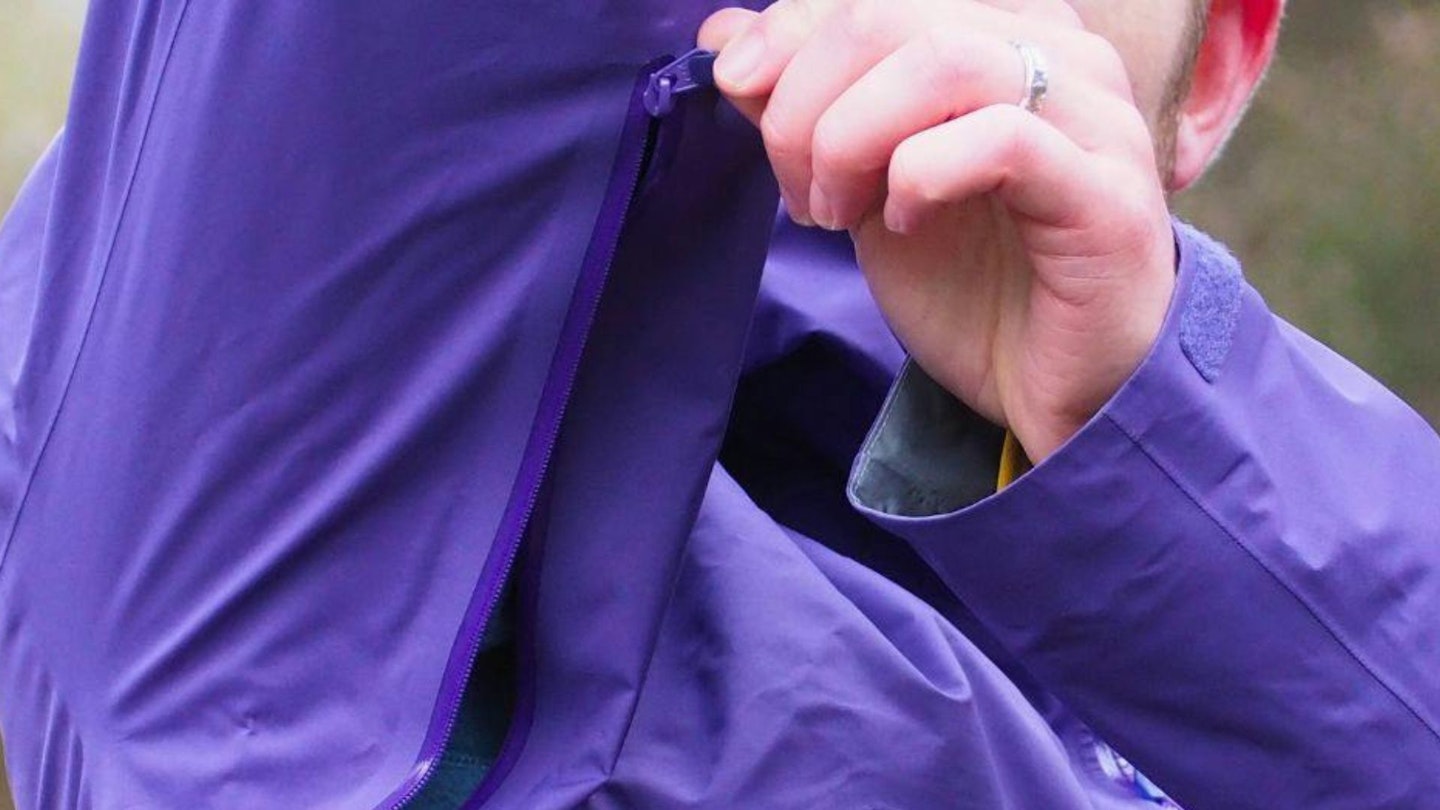 Pitzip on a purple jacket