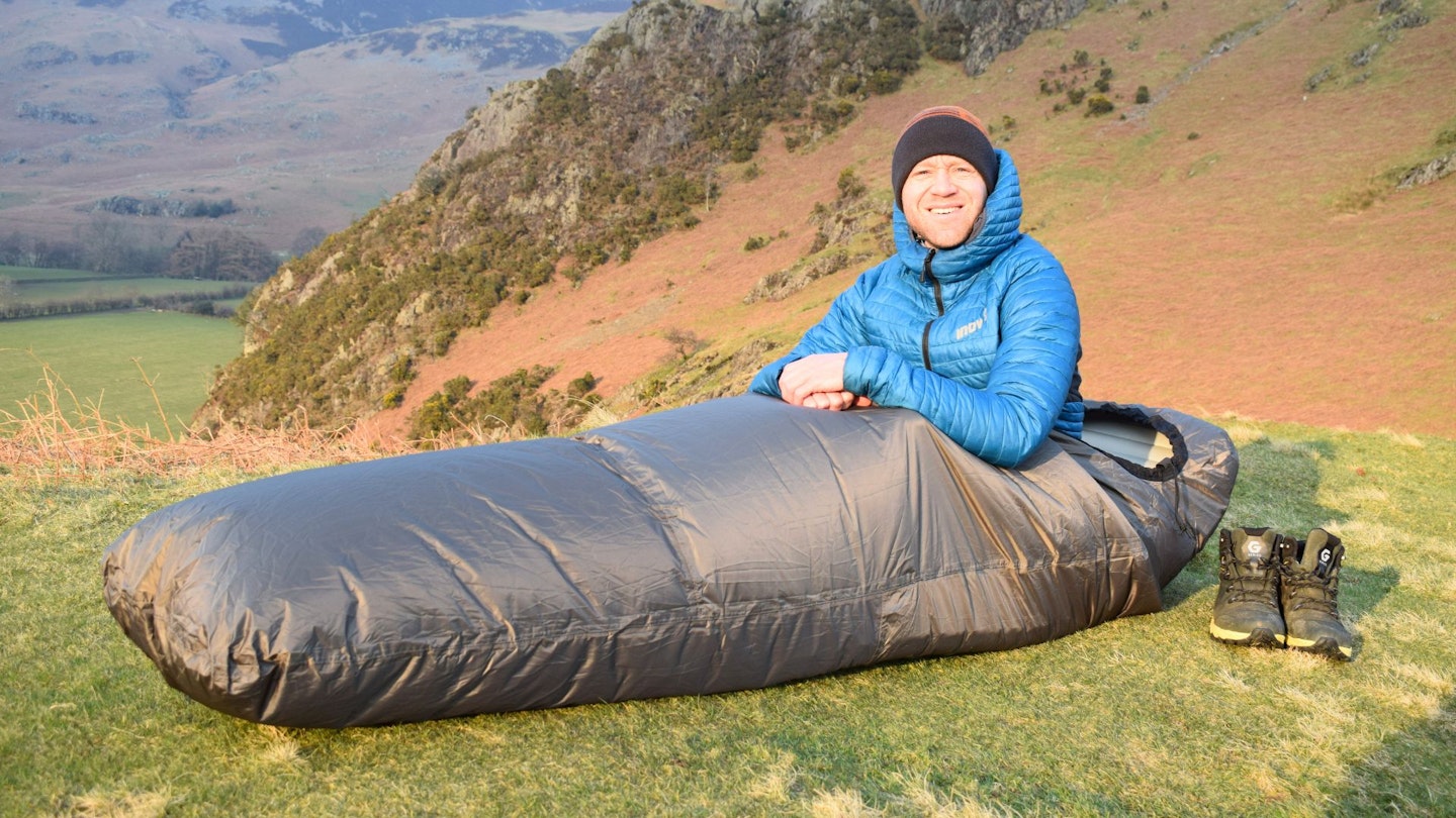 James Forrest sitting up in Mountain Warehouse Waterproof Bivvy Bag