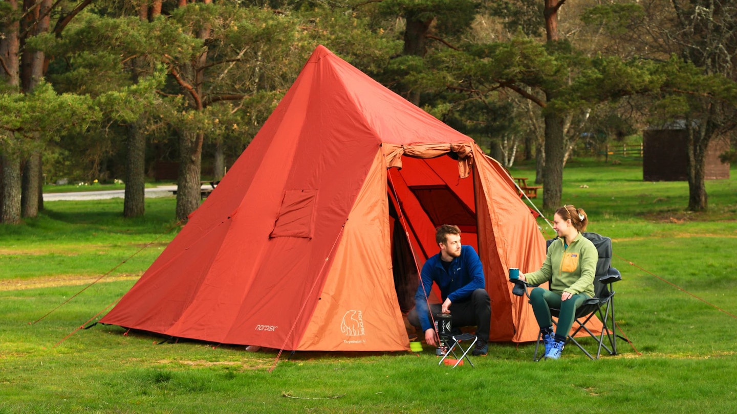 LFTO testers sitting in front of Nordisk Thrymheim 5 PU tent, using a stove