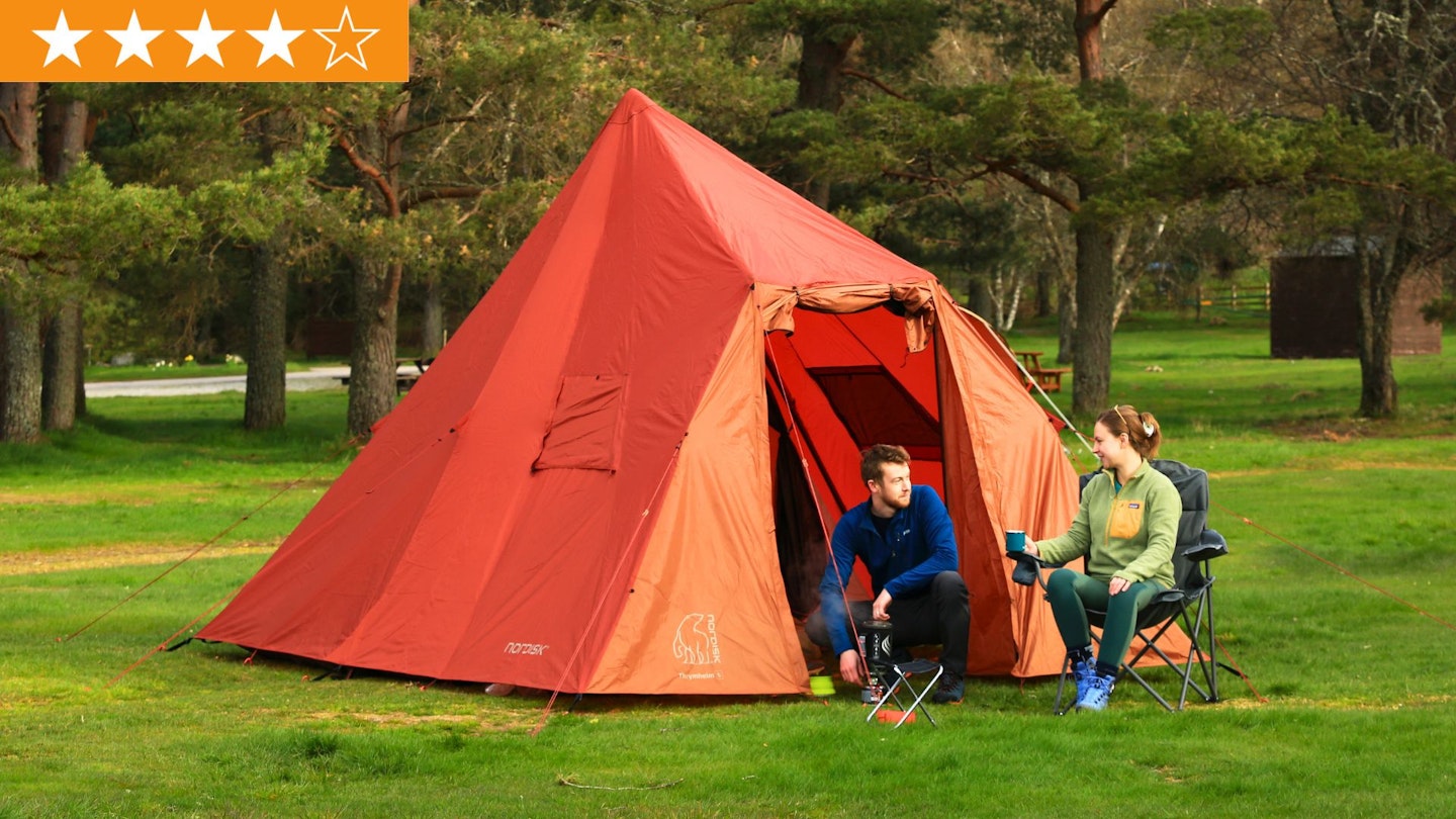 LFTO testers sitting in front of Nordisk Thrymheim 5 PU tent, using a stove with LFTO star ratings