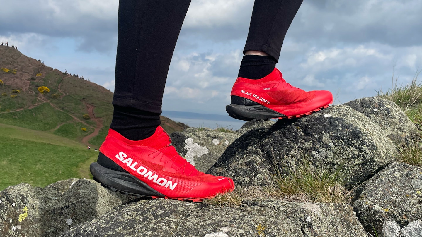 Our tester wearing Salomon Pulsar 3 trail running shoes