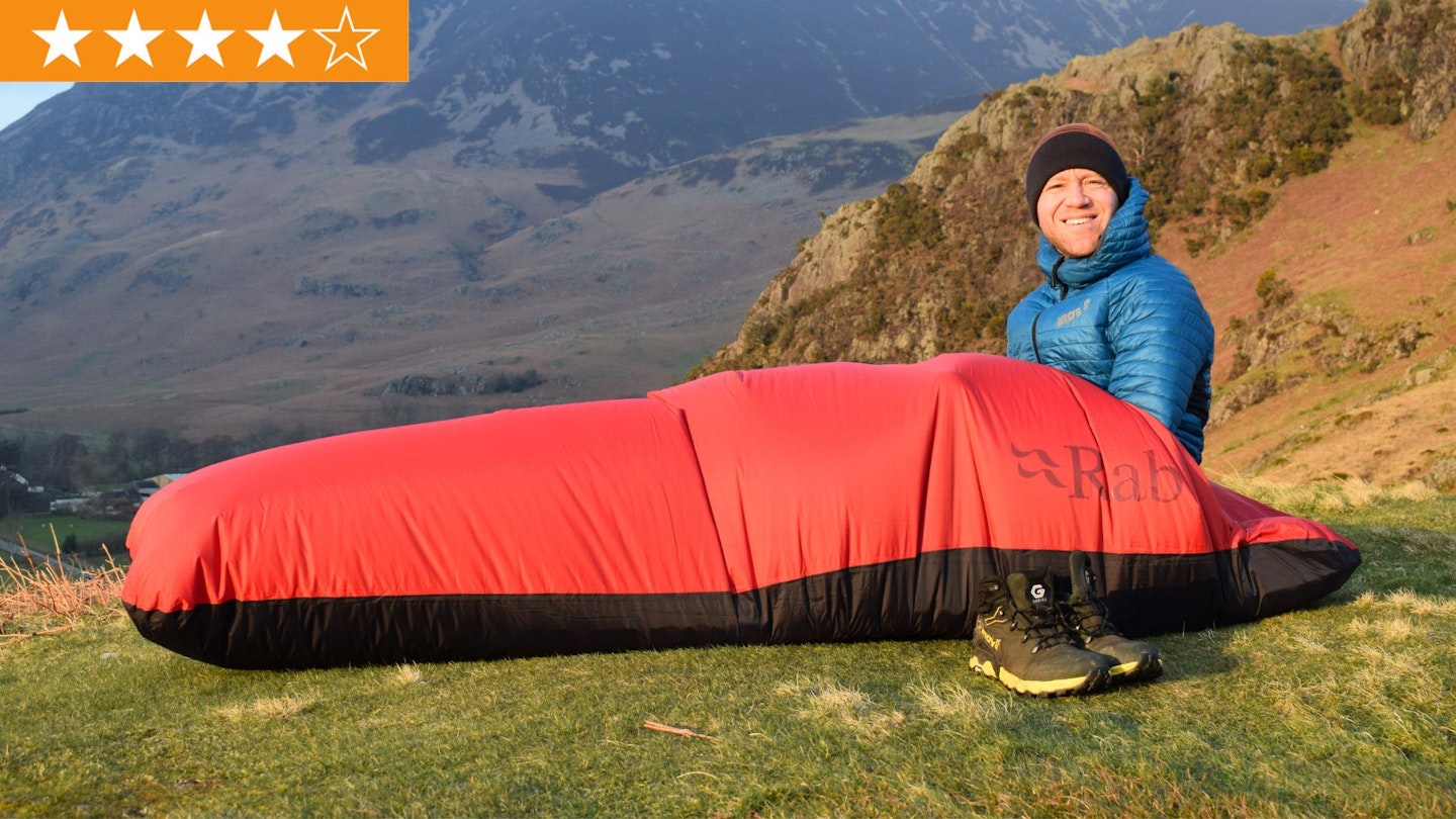 James Forrest camping with Rab Trailhead Bivi on a hillside with LFTO star rating