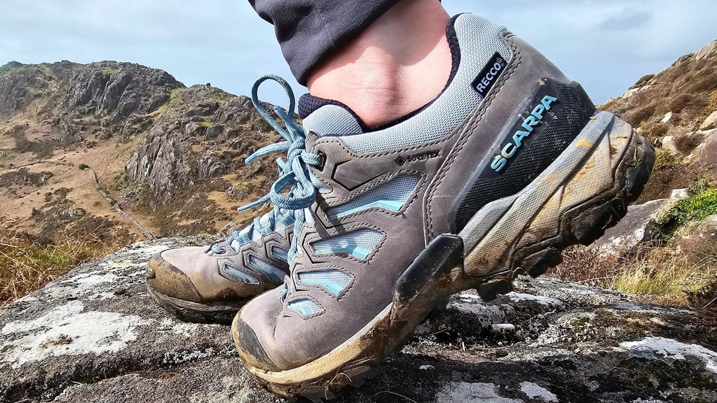 Side view of Scarpa Moraine GTX with foot flexed