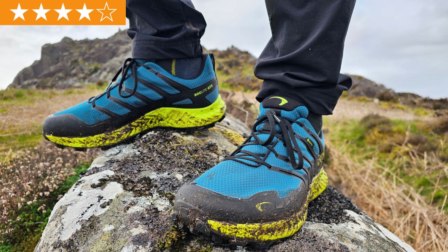 Closeup of LFTO tester wearing Inov-8 Roclite GTX shoes standing on a rock