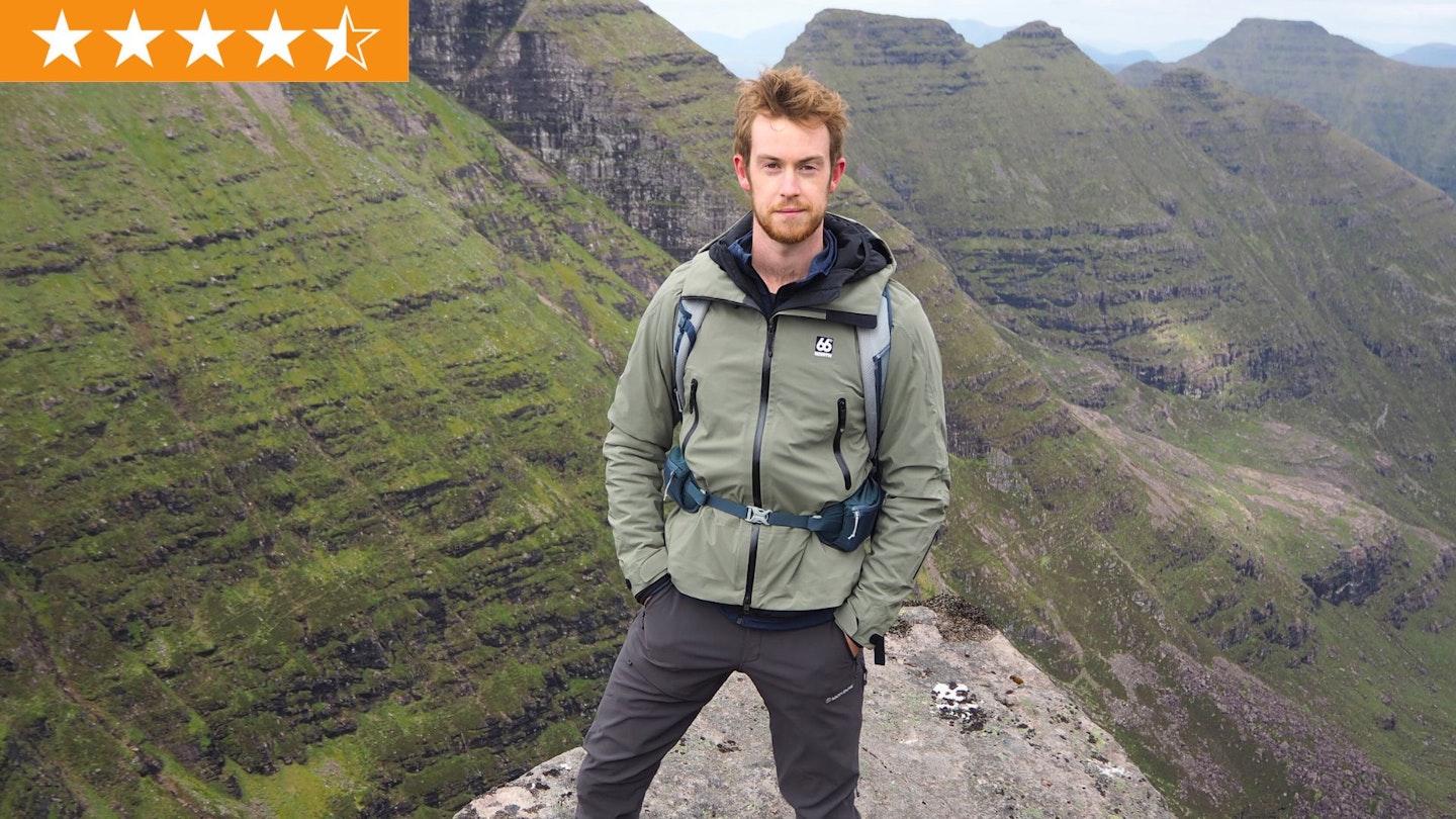 Chris Williams wearing 66°North Snaefell jacket on a hike with LFTO star rating in top left corner