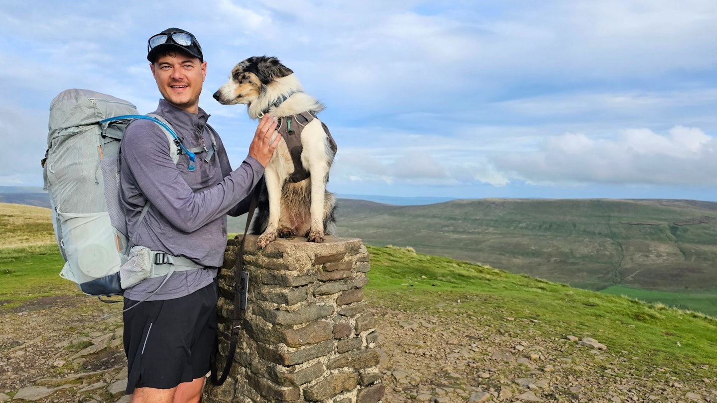 Matt Jones with his dog, wearing Deuter Aircontact Ultra 50+5